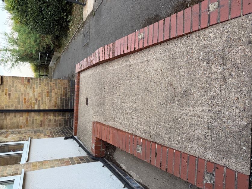 Walkway in Derby after pressure washing: clean and restored